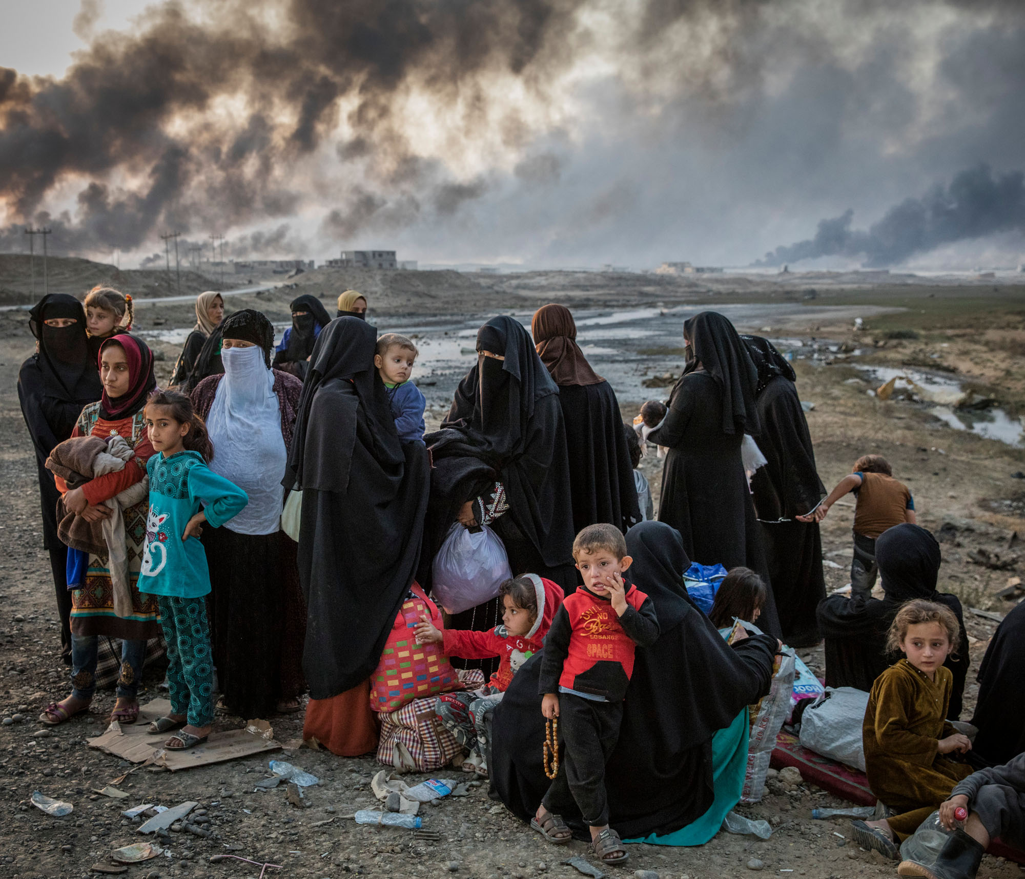 Iraq. Recently displaced Iraqis reach safety